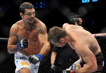 DALLAS - SEPTEMBER 19:  UFC fighter Vitor Belfort  (L) battles UFC fighter Rich Franklin (R) during their Catch weight bout at UFC 103: Franklin vs. Belfort at the American Airlines Center on September 19, 2009 in Dallas, Texas.  (Photo by Jon Kopaloff/Getty Images)