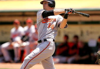 OAKLAND, CA - JUNE 07:  Nolan Reimold #14 of the Baltimore Orioles bats against the Oakland Athletics at the Oakland Coliseum on June 7, 2009 in Oakland, California.  (Photo by Ezra Shaw/Getty Images)