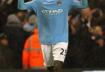 MANCHESTER, ENGLAND - DECEMBER 05:   Emmanuel Adebayor of Manchester City celebrates scoring his team's first goal during the Barclays Premier League match between Manchester City and Chelsea at the City of Manchester Stadium on December 5, 2009 in Manchester, England. (Photo by Alex Livesey/Getty Images)