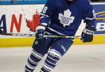 TORONTO - APRIL 3: Tie Domi #28 of the Toronto Maple Leafs skates during the game against the Buffalo Sabres at Air Canada Centre on April 3, 2006 in Toronto, Ontario, Canada. Sabres win 3-2 after shootout. (Photo by Graig Abel/Getty Images)
