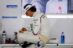 SUZUKA, JAPAN - OCTOBER 02:  Robert Kubica of Poland and BMW Sauber prepares to drive during practice for the Japanese Formula One Grand Prix at Suzuka Circuit on October 2, 2009 in Suzuka, Japan.  (Photo by Mark Thompson/Getty Images)