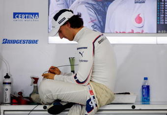 SUZUKA, JAPAN - OCTOBER 02:  Robert Kubica of Poland and BMW Sauber prepares to drive during practice for the Japanese Formula One Grand Prix at Suzuka Circuit on October 2, 2009 in Suzuka, Japan.  (Photo by Mark Thompson/Getty Images)