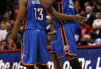 LOS ANGELES, CA - NOVEMBER 11:  Kevin Durant #35 of  the Oklahoma City Thunder celebrates with James Harden #13 in the final seconds of the game against the Los Angeles Clippers on November 11, 2009 at Staples Center in Los Angeles, California.   The Thunder won 83-79.   NOTE TO USER: User expressly acknowledges and agrees that, by downloading and/or using this Photograph, user is consenting to the terms and conditions of the Getty Images License Agreement.  (Photo by Stephen Dunn/Getty Images)
