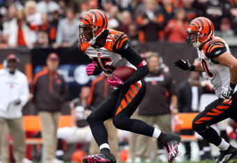 CLEVELAND - OCTOBER 04:  Chris Henry #15 of the Cincinnati Bengals runs the ball against the Cleveland Browns during their game at Cleveland Browns Stadium on October 4, 2009 in Cleveland, Ohio. The Bengals defeated the Browns 23-20 in overtime.  (Photo by Jim McIsaac/Getty Images)