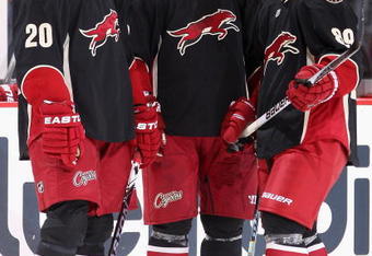 GLENDALE, AZ - DECEMBER 05:  (L-R) Robert Lang #20, Shane Doan #19 and Mikkel Boedker #89 of the Phoenix Coyotes talk during a time out from the NHL game against the Ottawa Senators at Jobing.com Arena on December 5, 2009 in Glendale, Arizona. The Coyotes defeated the Senators 3-2. (Photo by Christian Petersen/Getty Images)