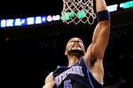 EAST RUTHERFORD, NJ - DECEMBER 16:  Carlos Boozer #5of the Utah Jazz dunks against the New Jersey Nets during their game on December 16, 2009 at the IZOD Center in East Rutherford, New Jersey.  NOTE TO USER: User expressly acknowledges and agrees that, by downloading and/or using this Photograph, user is consenting to the terms and conditions of the Getty Images License Agreement.  (Photo by Al Bello/Getty Images)  (Photo by Al Bello/Getty Images)