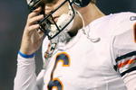 MINNEAPOLIS - NOVEMBER 29:  Jay Cutler #6 of the Chicago Bears walks off the field in the first half against the Minnesota Vikings on November 29, 2009 at Hubert H. Humphrey Metrodome in Minneapolis, Minnesota.  (Photo by Elsa/Getty Images)