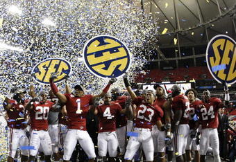 ATLANTA - DECEMBER 5:  The Alabama Crimson Tide celebrate as confetti falls after their 32-13 win against the Florida Gators during the SEC Championship game at Georgia Dome on December 5, 2009 in Atlanta, Georgia.  (Photo by Kevin C. Cox/Getty Images)