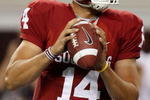ARLINGTON, TX - SEPTEMBER 05:  Quarterback Sam Bradford #14 of the Oklahoma Sooners drops back to pass against the Brigham Young Cougars at Cowboys Stadium on September 5, 2009 in Arlington, Texas.  (Photo by Ronald Martinez/Getty Images)