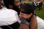 PITTSBURGH - DECEMBER 05:  DJ Woods #3 of the Cincinnati Bearcats is hugged by a teammate after their win against the University of Pittsburgh Panthers on December 5, 2009 at Heinz Field in Pittsburgh, Pennsylvania.  (Photo by Jared Wickerham/Getty Images)