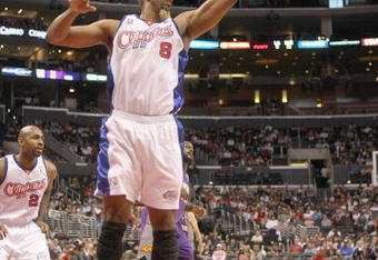 LOS ANGELES, CA - JANUARY 11: Brian Skinner #8 of the Los Angeles Clippers rebounds the ball against the Phoenix Suns on January 11, 2009 at Staples Center in Los Angeles, California.  The Suns won 109-103.   NOTE TO USER: User expressly acknowledges and agrees that, by downloading and/or using this Photograph, user is consenting to the terms and conditions of the Getty Images License Agreement.  (Photo by Stephen Dunn/Getty Images)