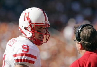 AUSTIN, TX - OCTOBER 27: Quarterback Sam Keller #9 of the Nebraska Cornhuskers talks with head coach Bill Callahan during a game against the Texas Longhorns at Darrell K Royal-Texas Memorial Stadium October 27, 2007 in Austin, Texas. (Photo by Brian Bahr/Getty Images) 