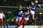 BIRMINGHAM, ENGLAND - DECEMBER 15:  Goalkeeper Joe Hart of Birmingham colides with his own defender Roger Johnson as he clears a cross during the Barclays Premier League match between Birmingham City and Blackburn Rovers at St. Andrews on December 15, 2009 in Birmingham, England.  (Photo by Richard Heathcote/Getty Images)