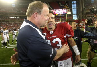 GLENDALE, AZ - DECEMBER 28:  Head coach Mike Holmgren of the Seattle Seahawks greets quarterback Kurt Warner #13 of the Arizona Cardinals on December 28, 2008 at University of Phoenix Stadium in Glendale, Arizona.  The Cardinals won 34-21.  (Photo by Stephen Dunn/Getty Images)