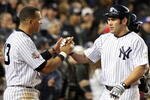 NEW YORK - NOVEMBER 04:  Alex Rodriguez #13 of the New York Yankees congratulates Johnny Damon #18 after Damon scored in a 2-run single by Hideki Matsui #55 in the bottom of the third inning against the Philadelphia Phillies in Game Six of the 2009 MLB World Series at Yankee Stadium on November 4, 2009 in the Bronx borough of New York City.  (Photo by Jed Jacobsohn/Getty Images)