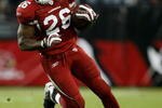 GLENDALE, AZ - NOVEMBER 15:  Beanie Wells #26 of the Arizona Cardinals carries the ball against the Seattle Seahawks in the second half at University of Phoenix Stadium on November 15, 2009 in Glendale, Arizona. The Cardinals defeated the Seahawks 31-20.  (Photo by Jeff Gross/Getty Images)