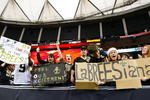 ATLANTA - DECEMBER 13:  Fans of the New Orleans Saints hold up signs after their 26-23 win over the Atlanta Falcons at Georgia Dome on December 13, 2009 in Atlanta, Georgia.  (Photo by Kevin C. Cox/Getty Images)