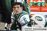 EAST RUTHERFORD, NJ - NOVEMBER 29:  Mark Sanchez #6 of the New York Jets sits on the bench after injuring his knee on a play against the Carolina Panthers at Giants Stadium on November 29, 2009 in East Rutherford, New Jersey.  (Photo by Nick Laham/Getty Images)