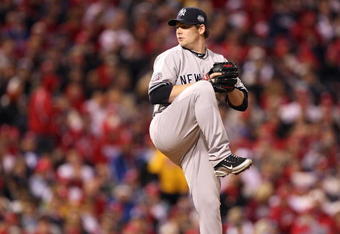 PHILADELPHIA - NOVEMBER 02:  Phil Coke #48 of the New York Yankees throws a pitch against the Philadelphia Phillies in Game Five of the 2009 MLB World Series at Citizens Bank Park on November 2, 2009 in Philadelphia, Pennsylvania. The Phillies won 8-6.  (Photo by Jed Jacobsohn/Getty Images)