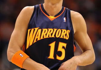 PHOENIX - OCTOBER 30:  Andris Biedrins #15 of the Golden State Warriors during the NBA game against the Phoenix Suns at US Airways Center on October 30, 2009 in Phoenix, Arizona. The Suns defeated the Warriors 123-101.  NOTE TO USER: User expressly acknowledges and agrees that, by downloading and or using this photograph, User is consenting to the terms and conditions of the Getty Images License Agreement.  (Photo by Christian Petersen/Getty Images)