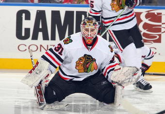 BUFFALO, NY - DECEMBER 11:  Goalie Antti Niemi #31 of the Chicago Blackhawks warms up before the game against the Buffalo Sabres at HSBC Arena on December 11, 2009 in Buffalo, New York. (Photo by Rick Stewart/Getty Images)