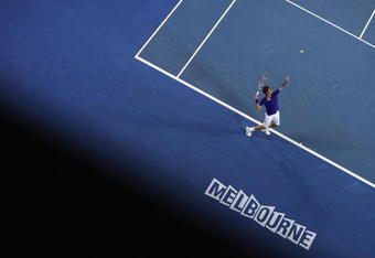 MELBOURNE, AUSTRALIA - FEBRUARY 01:  Roger Federer of Switzerland serves in his men's final match against Rafael Nadal of Spain during day fourteen of the 2009 Australian Open at Melbourne Park on  February 1, 2009 in Melbourne, Australia.  (Photo by Ezra Shaw/Getty Images)