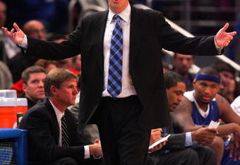 NEW YORK - DECEMBER 09:  Head coach John Calipari of the Kentucky Wildcats watches the game against the Connecticut Huskies talks with the referee during the game against at the SEC Big East Invitational at Madison Square Garden on December 9, 2009 in New York, New York. The Wildcats defeated the Huskies 64-61. (Photo by Chris Trotman/Getty Images)