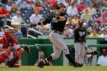 WASHINGTON - AUGUST 06:  First baseman Nick Johnson #20 of the Florida Marlins takes an at bat against the Washington Nationals at Nationals Park on August 6, 2009 in Washington, DC. The Nationals defeated the Marlins 12-8.  (Photo by Doug Pensinger/Getty Images)