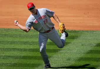 DENVER - SEPTEMBER 07:  Third baseman Scott Rolen #27 of the Cincinnati Reds fields a grounder against the Colorado Rockies at Coors Field on September 7, 2009 in Denver, Colorado. The Rockies defeated the Reds 4-3.  (Photo by Doug Pensinger/Getty Images)