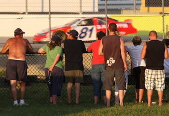 WEST ALLIS, WI - JUNE 20: Fans watch the NASCAR Nationwide Series NorthernTool.com 250 on June 20, 2009 at the Milwaukee Mile in West Allis, Wisconsin. (Photo by Jonathan Daniel/Getty Images for NASCAR)