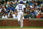 CHICAGO - AUGUST 28: Right fielder Milton Bradley #21 of the Chicago Cubs jogs off of the field after scoring in the first inning against the New York Mets at Wrigley Field on August 28, 2009 in Chicago, Illinois. (Photo by Jonathan Daniel/Getty Images)