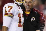 LANDOVER, MD - OCTOBER 26:  Head coach Jim Zorn of the Washington Redskins jokes around with quarterback Jason Campbell #17 during warm ups before the game against the Philadelphia Eagles at FedEx Field October 26, 2009 in Landover, Maryland. (Photo by Win McNamee/Getty Images)