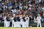 SEATTLE - SEPTEMBER 20:  The Seattle Mariners stand for the national anthem before the game against the New York Yankees on September 20, 2009 at Safeco Field in Seattle, Washington. (Photo by Otto Greule Jr/Getty Images)