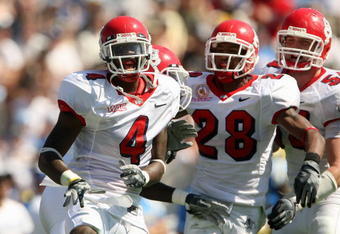 PASADENA, CA - SEPTEMBER 27:  Damion Owens #4, A.J. Jefferson #28 and Ben Jacobs #54 of the Frenso State Bulldogs celebrates a defensive play against the UCLA Bruins during the game on September 27, 2008 at the Rose Bowl in Pasadena, California.  (Photo by Stephen Dunn/Getty Images)