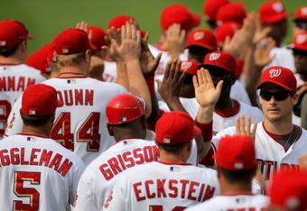 WASHINGTON - AUGUST 06:  The Washington Nationals celebrate their 12-8 victory over the Florida Marlins at Nationals Park on August 6, 2009 in Washington, DC.  (Photo by Doug Pensinger/Getty Images)
