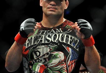 LOS ANGELES, CA - OCTOBER 24:  UFC fighter Cain Velasquez poses after his victory over UFC fighter Ben Rothwell (not pictured) in their Heavyweight bout at UFC 104: Machida vs. Shogun at Staples Center on October 24, 2009 in Los Angeles, California.  Velasquez won the fight by way of TKO.  (Photo by Jon Kopaloff/Getty Images)