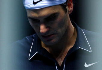 LONDON, ENGLAND - NOVEMBER 28:  Roger Federer of Switzerland reacts during the men's singles semi final match against Nikolay Davydenko of Russia during the Barclays ATP World Tour Finals at the O2 Arena on November 28, 2009 in London, England.  (Photo by Julian Finney/Getty Images)