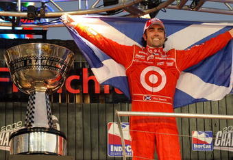 HOMESTEAD, FL - OCTOBER 10:  Dario Franchitti driver of the #10 Target Chip Ganassi Racing Dallara Honda celebrates after winning the IRL IndyCar Series Firestone Indy 300 and the IRL IndyCar Series Championship on October 10, 2009 at Homestead-Miami Speedway in Homestead, Florida.  (Photo by Robert Laberge/Getty Images)