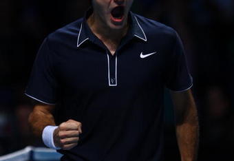LONDON, ENGLAND - NOVEMBER 26:  Roger Federer of Switzerland celebrates a point during the men's singles round robin match against Juan Martin Del Potro of Argentina during the Barclays ATP World Tour Finals at the O2 Arena on November 26, 2009 in London, England  (Photo by Julian Finney/Getty Images)