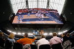 ARLINGTON, TX - DECEMBER 19: Fans watch a game between the Texas Longhorns and the North Carolina Tar Heels at Cowboys Stadium on December 19, 2009 in Arlington, Texas.  (Photo by Ronald Martinez/Getty Images)