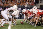 ARLINGTON, TX - DECEMBER 5: Sam Meginnis #67 of the Nebraska Cornhuskers gets ready to hike the ball during the Big 12 Football Championship game against the Texas Longhorns at Cowboys Stadium on December 5, 2009 in Arlington, Texas. (Photo by Jamie Squire/Getty Images)