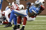 DETROIT - DECEMBER 20:  Calvin Johnson #81 of the Detroit Lions is tackled after a first quarter catch by Antrel Rolle #21 of the Arizona Cardinals on December 20, 2009 at Ford Field in Detroit, Michigan.  (Photo by Gregory Shamus/Getty Images)