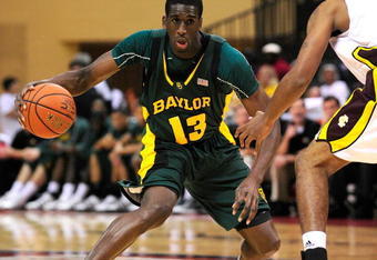 ORLANDO, FL - NOVEMBER 27:  Ekpe Udoh #13 of the Baylor Bears drives against the Iona Gaels during the Old Spice Classic at Disney's Milk House on November 27, 2009 in Orlando, Florida.  (Photo by Sam Greenwood/Getty Images)