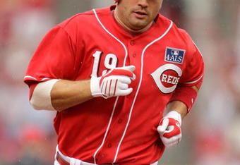 CINCINNATI - JULY 04:  Joey Votto #19 of the Cincinnati Reds runs the bases after hitting a home run during the game against the St. Louis Cardinals at the Great American Ball Park on July 4, 2009 in Cincinnati, Ohio.  (Photo by Andy Lyons/Getty Images)