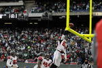 EAST RUTHERFORD, NJ - DECEMBER 20: Tony Gonzalez #88 of the Atlanta Falcons throws the ball through the upright after scoring a touchdown during an NFL game against the New York Jets at Giants Stadium on December 20, 2009 in East Rutherford, New Jersey. (Photo by Jim Luzzi/Getty Images)