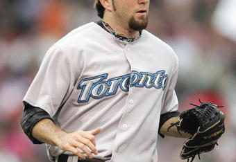 BOSTON - JULY 13: Pitcher Shaun Marcum #28 of the Toronto Blue Jays looks on during the game against the Boston Red Sox on July 13, 2007 at Fenway Park in Boston, Massachusetts. (Photo by Elsa/Getty Images) 