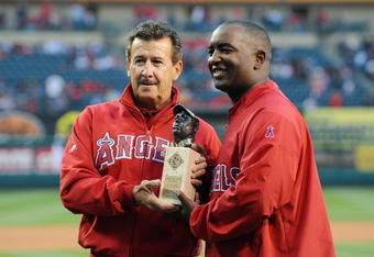 ANAHEIM, CA - APRIL 07:  Owner of the Los Angeles Angels of Anaheim Arturo Moreno presents Tony Reagins with the Andrew Foster Legacy Award before the game against the Oakland Athletics on April 7, 2009 in Anaheim, California.  (Photo by Lisa Blumenfeld/Getty Images)