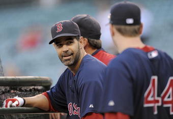 ANAHEIM, CA - OCTOBER 08:  Mike Lowell  #25 of the Boston Red Sox and Jason Bay #44 talk during batting practice before Game One of the ALDS against the of the Los Angeles Angels of Anaheim during the 2009 MLB Playoffs at Angel Stadium on October 8, 2009 in Anaheim, California.  (Photo by Lisa Blumenfeld/Getty Images)