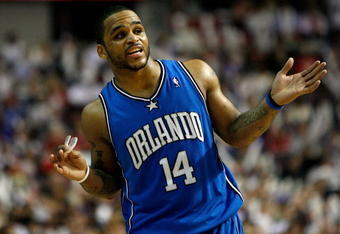 AUBURN HILLS, MI - MAY 13:  Jameer Nelson #14 of the Orlando Magic reacts against the Detroit Pistons in Game Five of the Eastern Conference Semifinals during the 2008 NBA Playoffs at the Palace of Auburn Hills in Auburn Hills, Michigan.  NOTE TO USER: User expressly acknowledges and agrees that, by downloading and or using this photograph, User is consenting to the terms and conditions of the Getty Images License Agreement.  (Photo by Gregory Shamus/Getty Images)