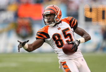 SAN DIEGO - DECEMBER 20:  Chad Ochocinco #85 of the Cincinnati Bengals carries the ball against the San Diego Chargers on December 20, 2009 at Qualcomm Stadium in San Diego, California.  The Chargers won 27-24.  (Photo by Stephen Dunn/Getty Images)